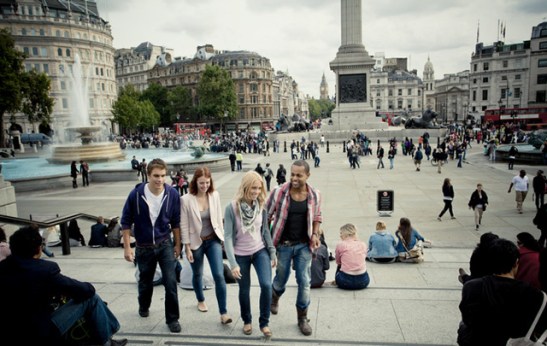 Visitors enjoy Trafalgar Square and surrounding area
